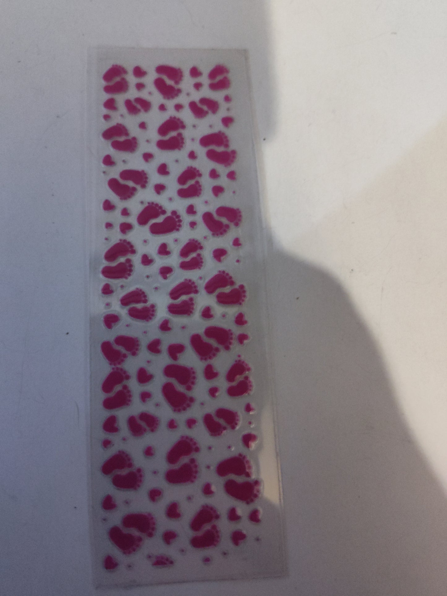 Pink footprint pen wrap